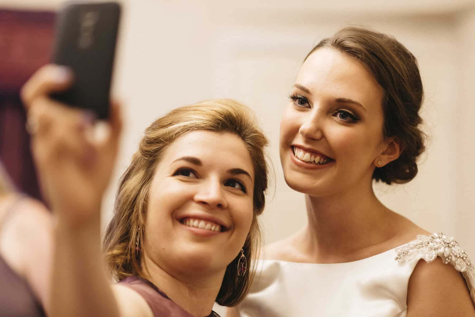 bride and bridesmaid selfie
