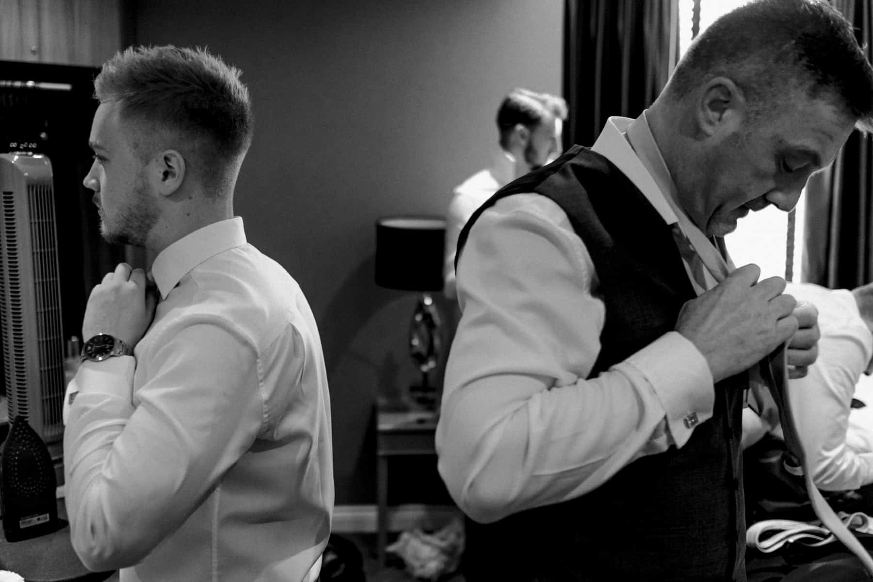 Father of the groom getting ready