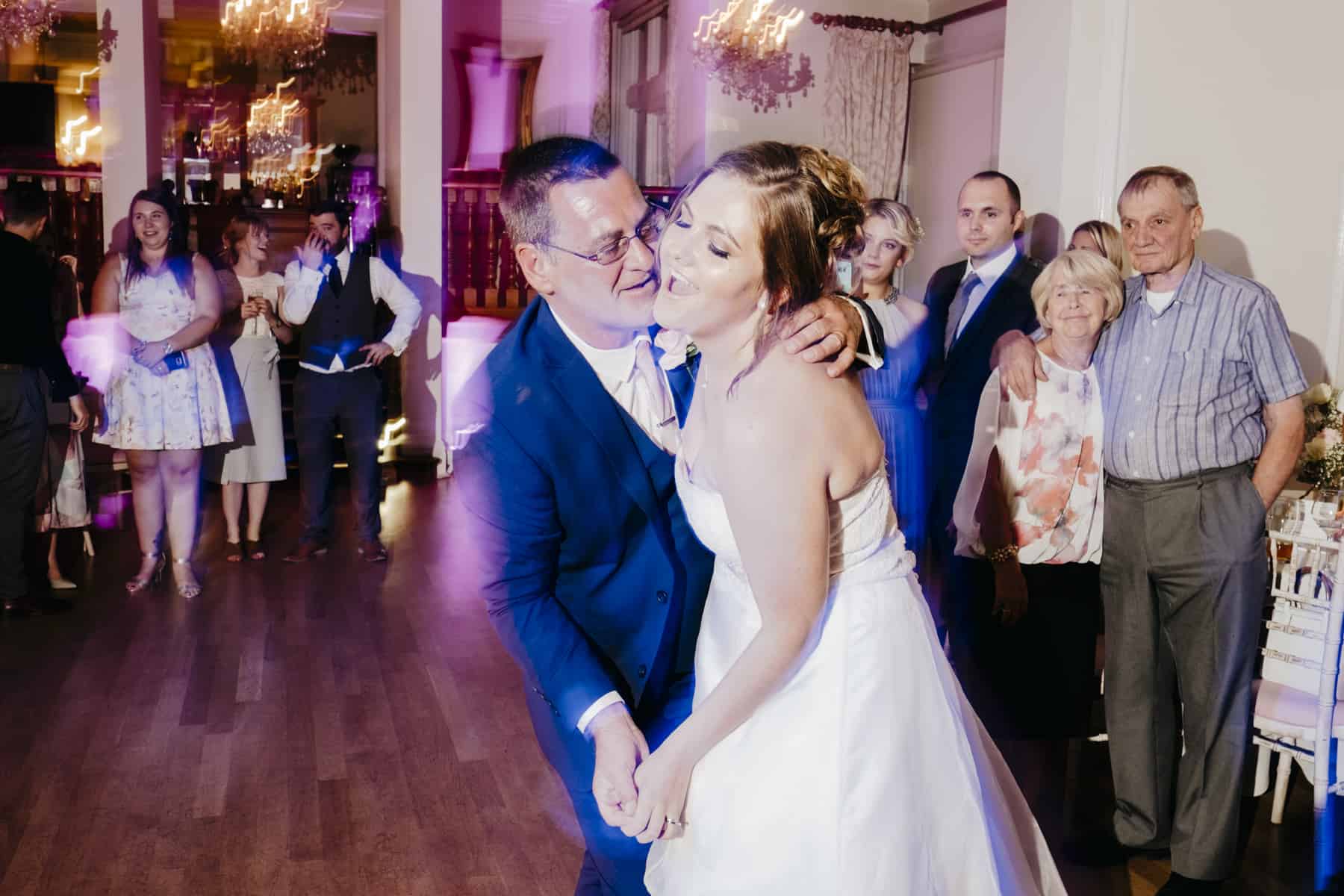 bride dances with her dad