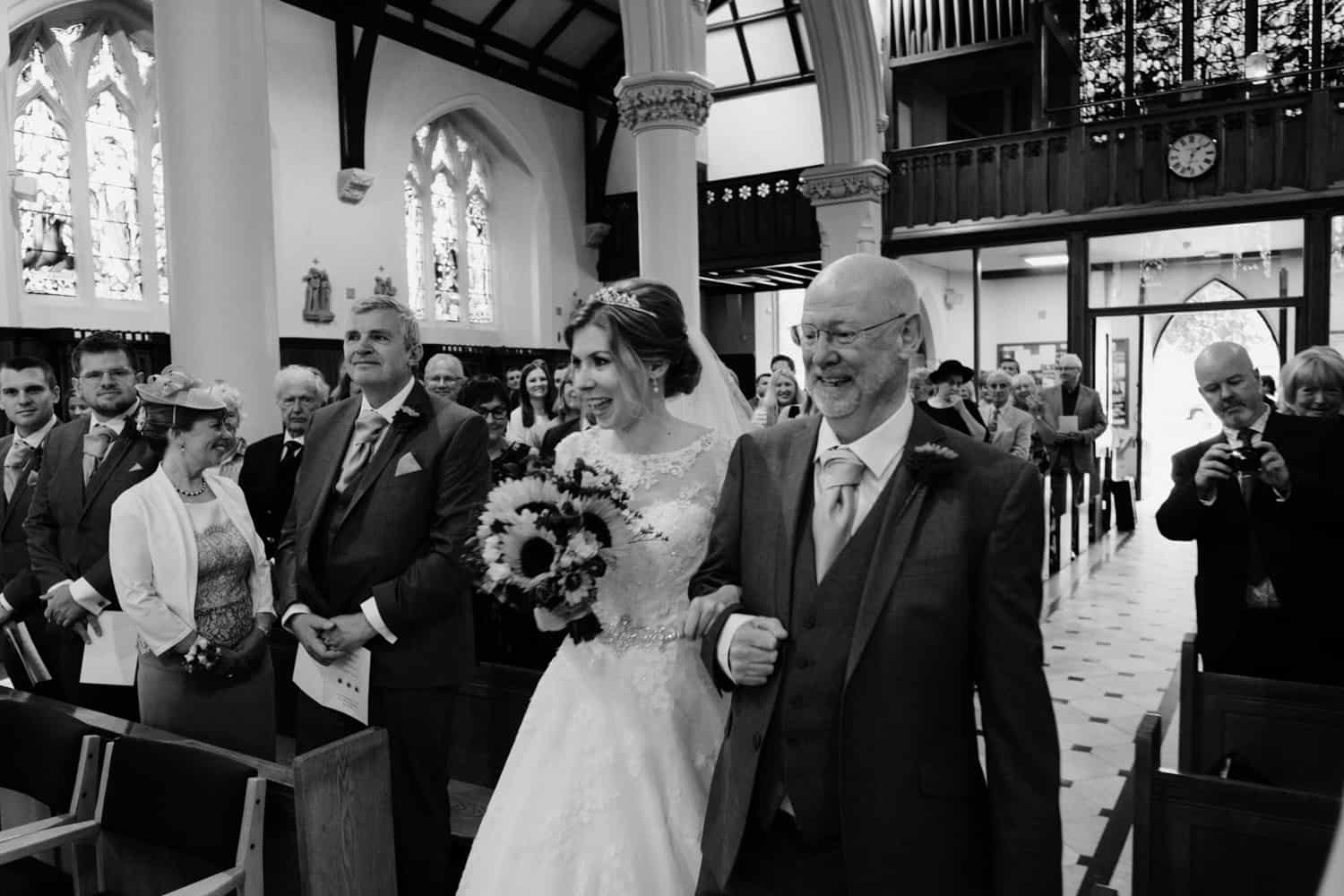 bride and her dad at the altar