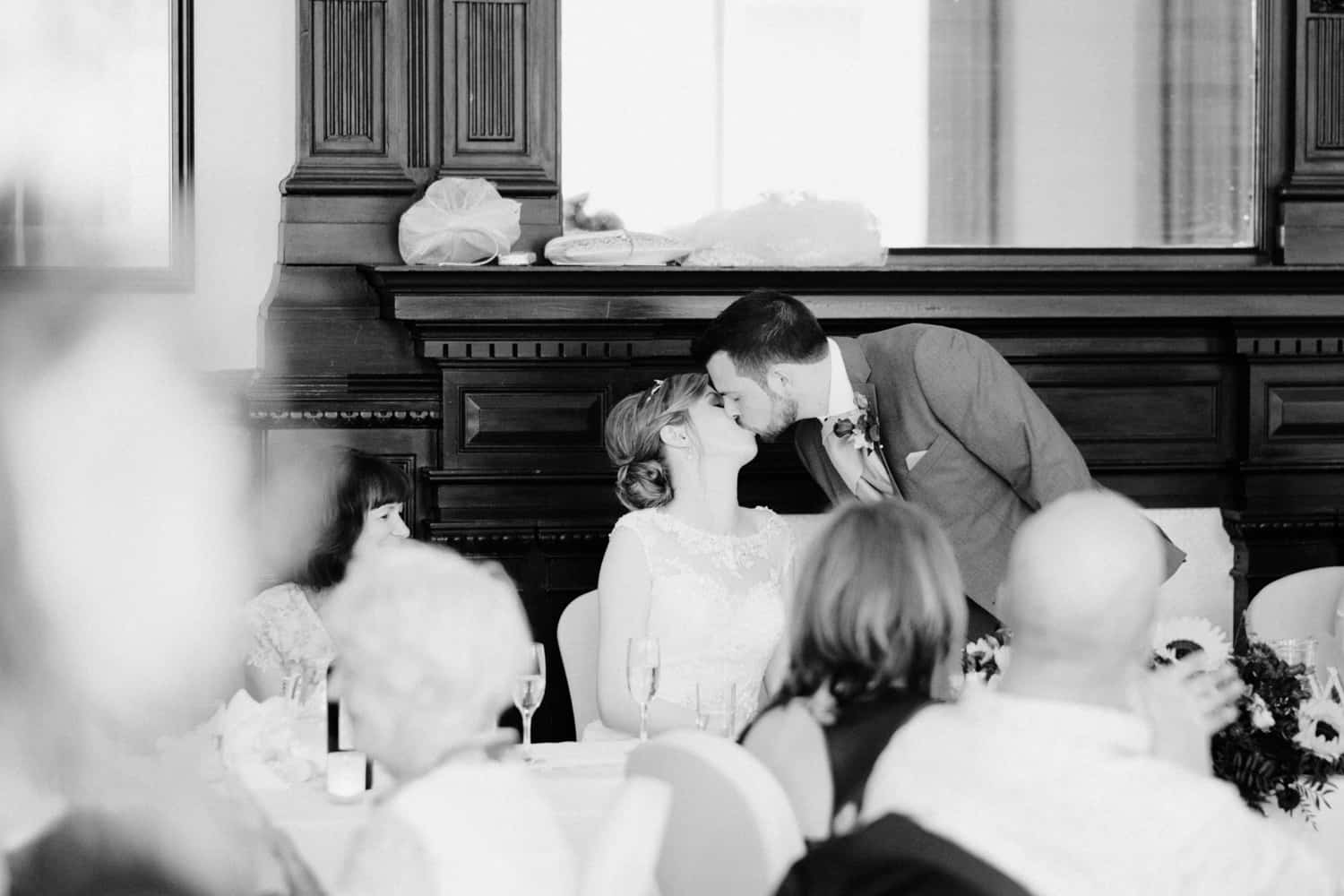 bride and groom kissing